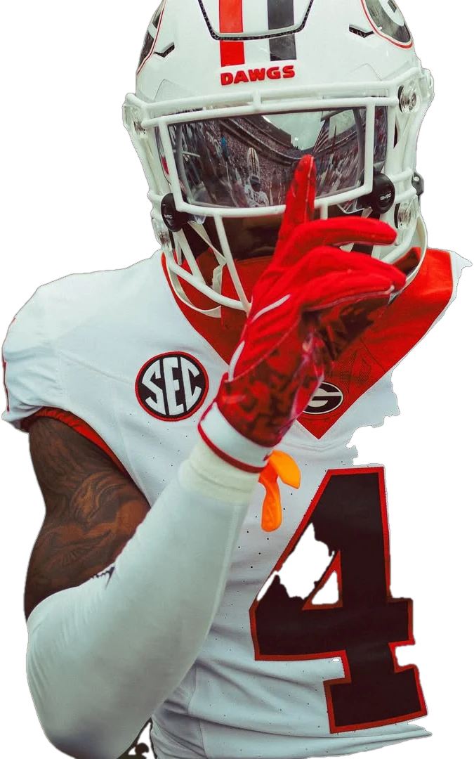 KJ Bolden in his white helmet with a finger to his lips